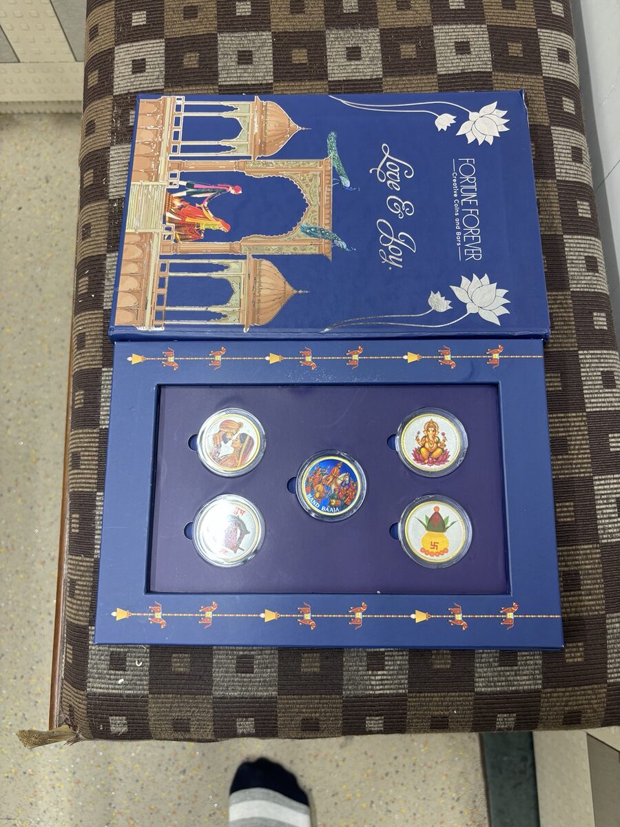 Silver coin in gift presentation box